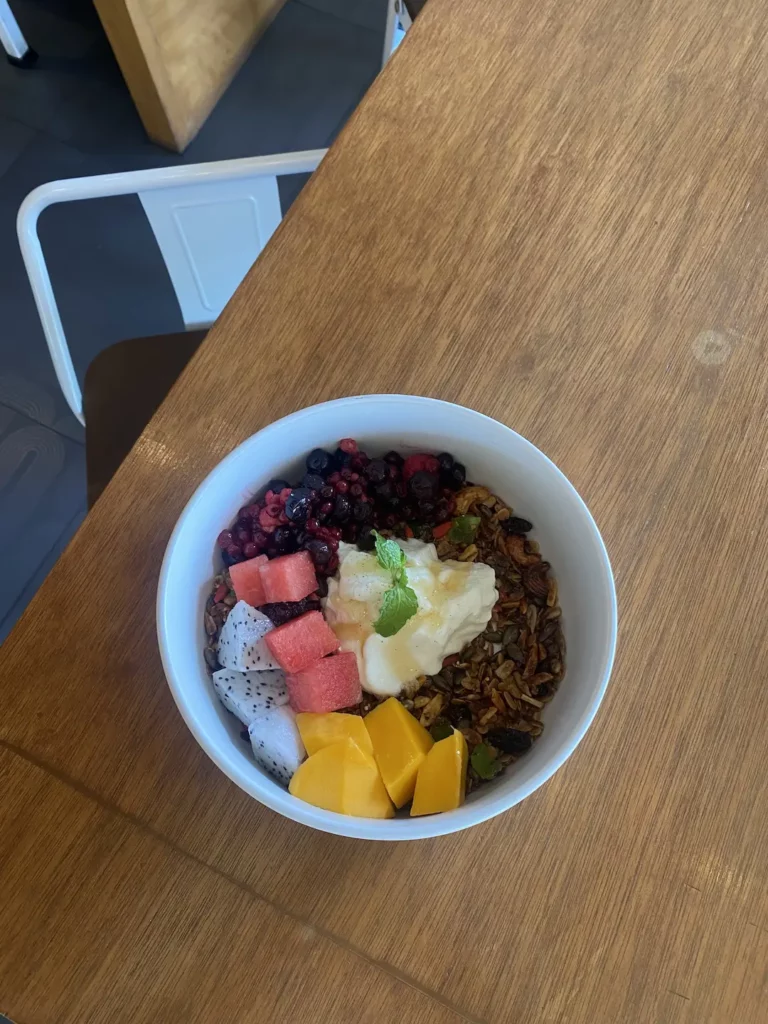 Homemade museli, winter berries, mango, watermelon at the spot with the best all day breakfast in Phuket: Poached Breakfast Cafe, Chalong, Phuket, Thailand