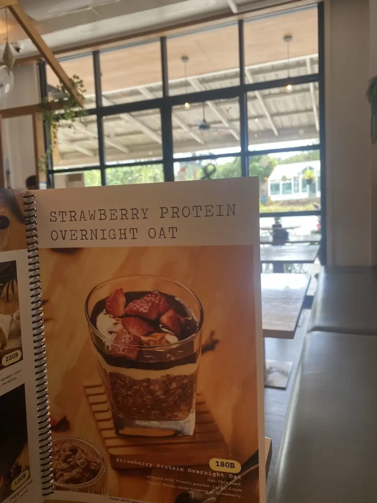 Strawberry overnight oats in a menu at one of the top food spots in Chalong: Poached Breakfast Cafe, Chalong, Phuket, Thailand