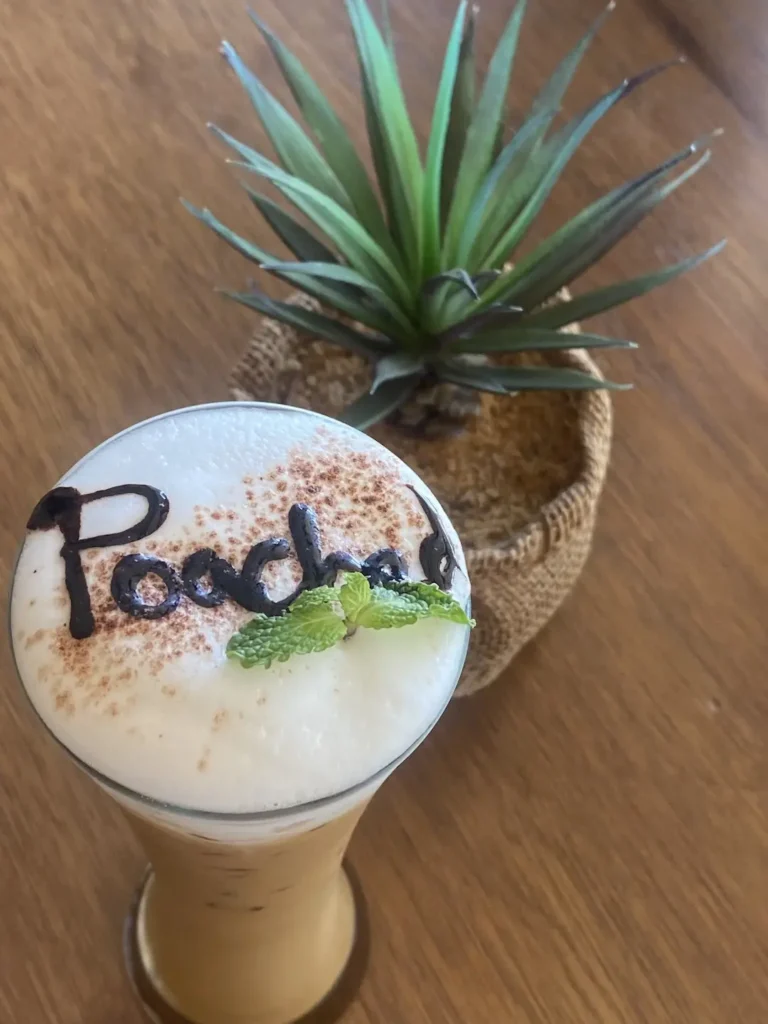 Our after eight iced cappuccino in a tall glass with decor is a great alternative to the best mocha in Chalong. Only at Poached Breakfast Cafe, Chalong, Phuket Thailand