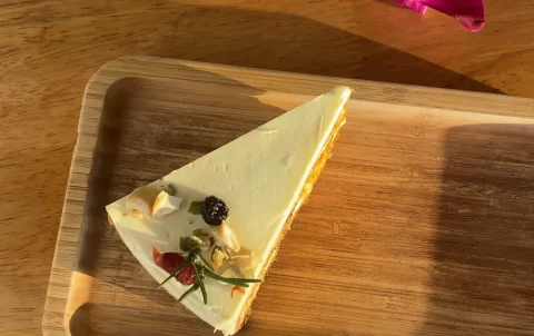 Cream cheese frosting, nuts and orchids on a sunny table. Only at the best cafe with Wi-Fi in Nai Harn, Poached Breakfast Cafe, Rawai, Phuket, Thailand