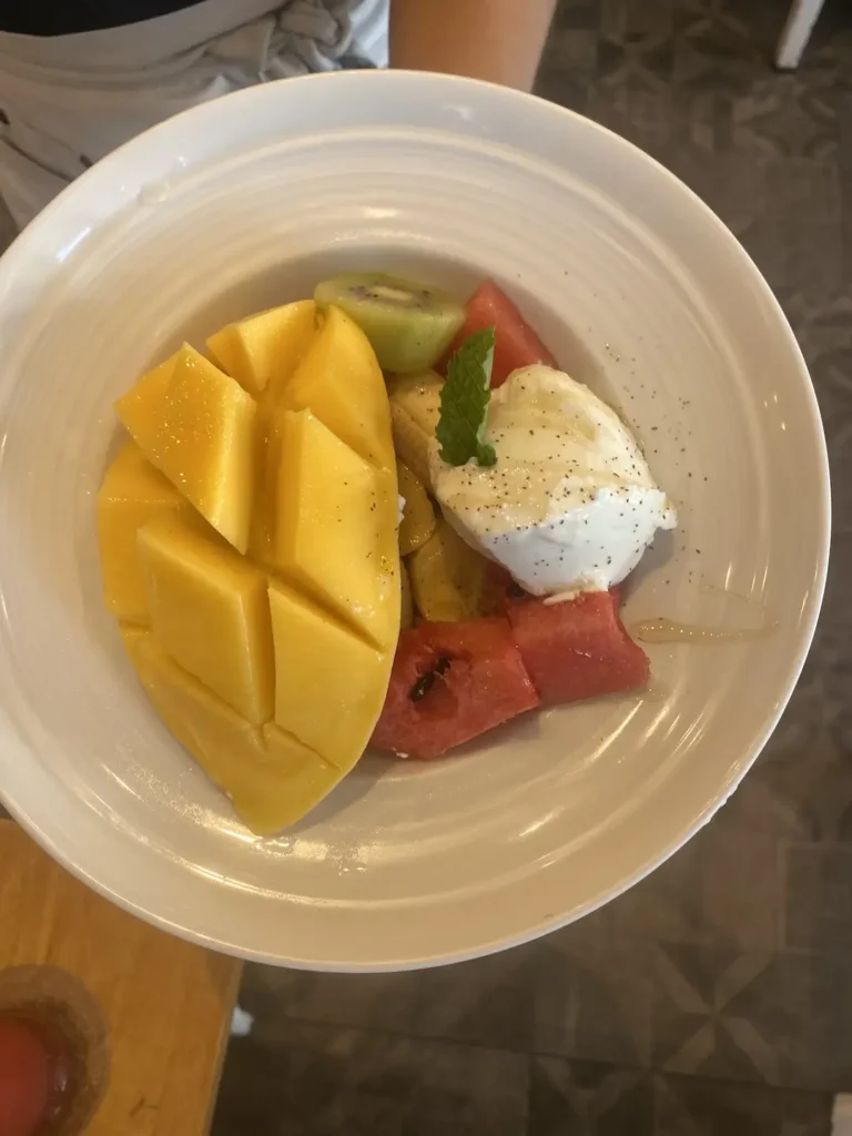 Fruit salad with seasonal fruit, creamy yoghurt, mango and more. This pairs perfectly with the best mocha in Chalong - only served at Poached Breakfast Cafe, Chalong, Phuket Thailand