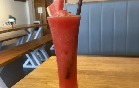 Watermelon Juice near Chalong - just sitting on a table with a slice of watermelon around the glass. Only at Poached Breakfast Cafe, Chalong, Phuket, Thailand