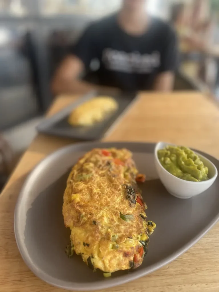Mexican flavours in an omelette next to a pot of smashed avocado. This is the perfect meal to refuel before or after a fitness class in Chalong. Only at Poached Breakfast Cafe, Chalong, Phuket, Thailand