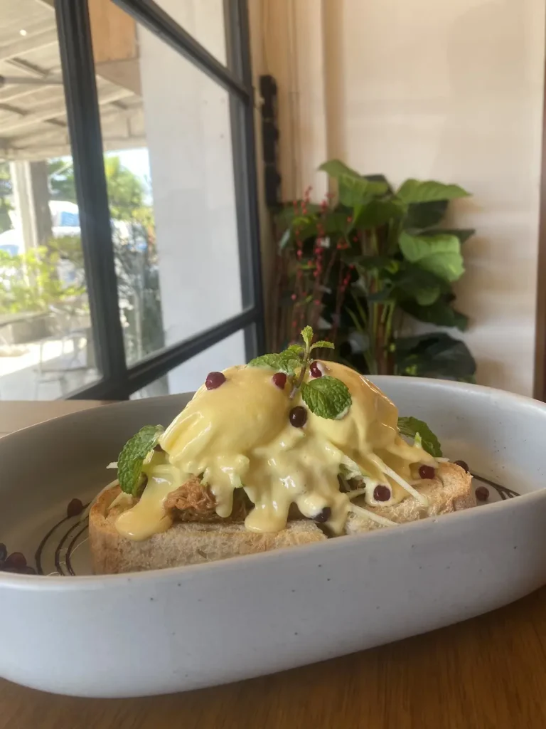 Pulled pork eggs benedict with pomegranate and mint. A great alternative to street food in Chalong. Only at Poached Breakfast Cafe, Chalong, Phuket, Thailand