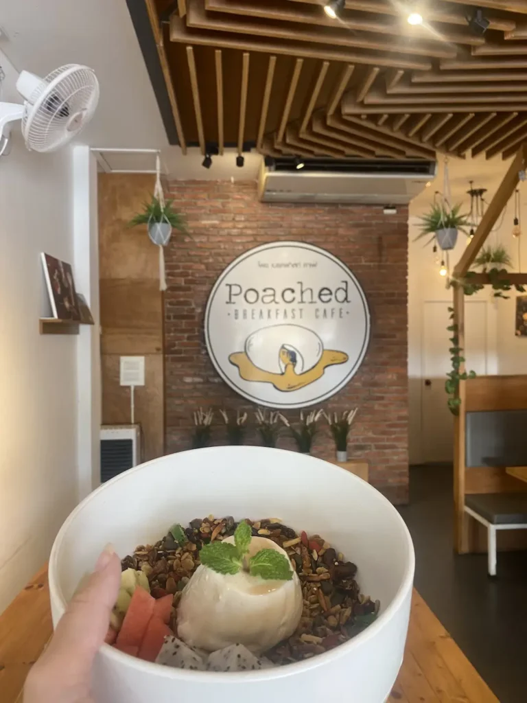 Vanilla panna cotta with granola and fresh fruit. A great alternative to street food in Chalong. Only at Poached Breakfast Cafe, Chalong, Phuket, Thailand