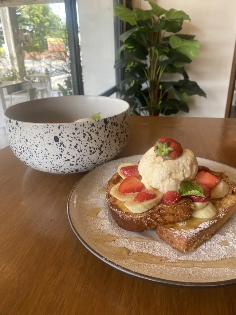 French toast with strawberries, banana and ice cream at one of the best indoor attractions in Phuket: at Poached Breakfast Cafe , Chalong, Phuket, Thailand