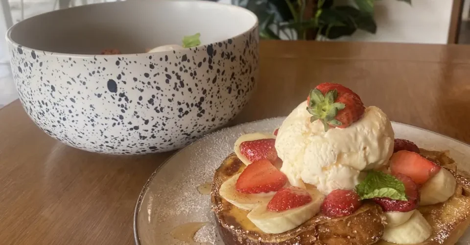 French toast with strawberries, banana and ice cream at one of the best indoor activities in Phuket: at Poached Breakfast Cafe , Chalong, Phuket, Thailand