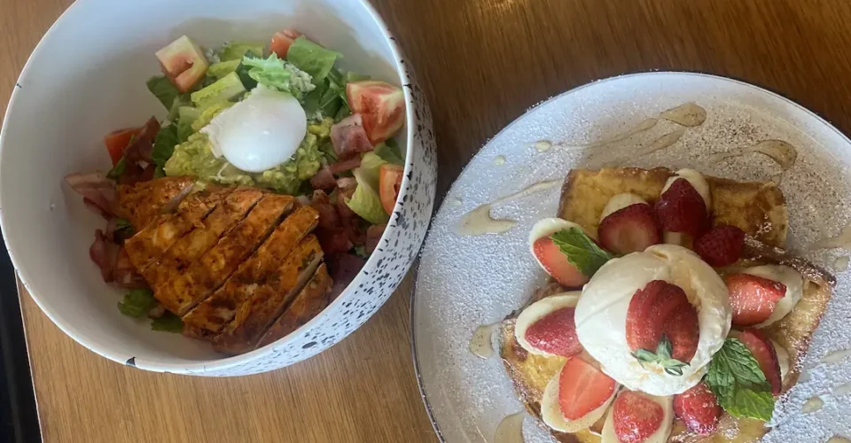 Cobb salad and french toast with strawberries, bananas and ice cream at the best place to fuel up before a day at one of the waterparks in Phuket - Poached Breakfast Cafe, Chalong, Phuket, Thailand