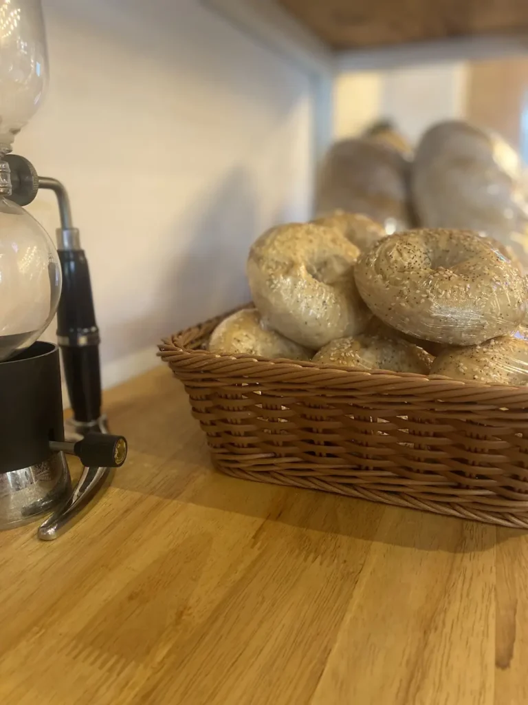 Fresh bagels in a basket at the place to fuel up before taking part in any water activities in Phuket - Poached Breakfast Cafe, Chalong, Phuket, Thailand